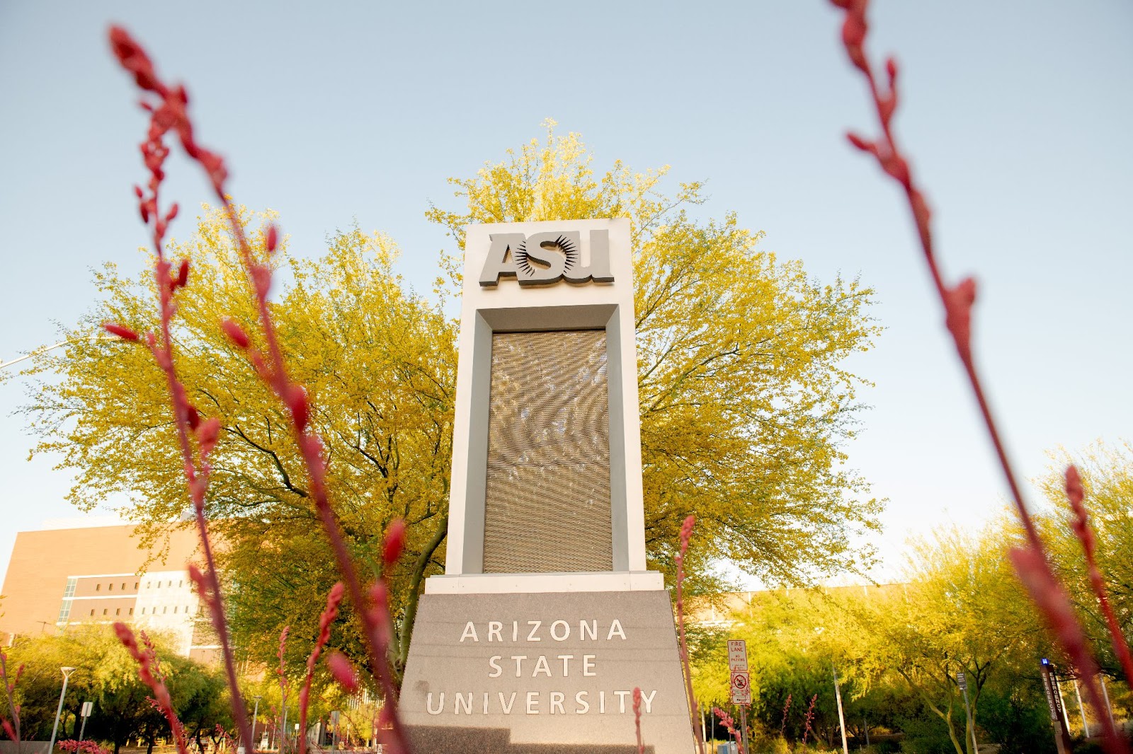ASU monument with trees in background